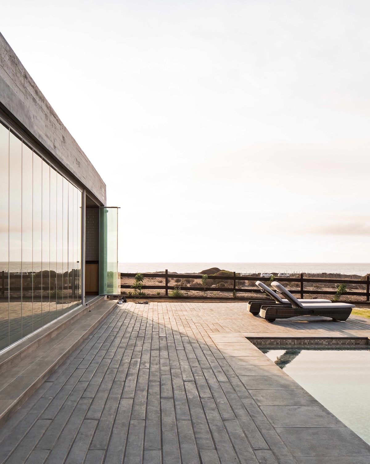 terraza_playera_cerrada_con_cortinas_de_cristal.jpg