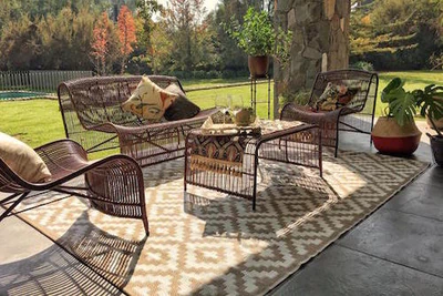 Terraza grande con juego de mimbre Carpintero