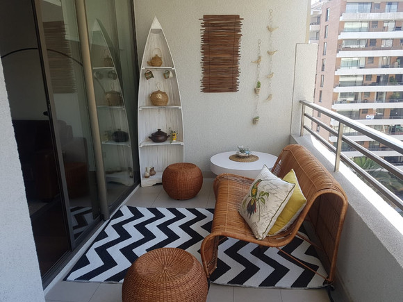 Terraza de 180 cm de ancho con muebles de mimbre