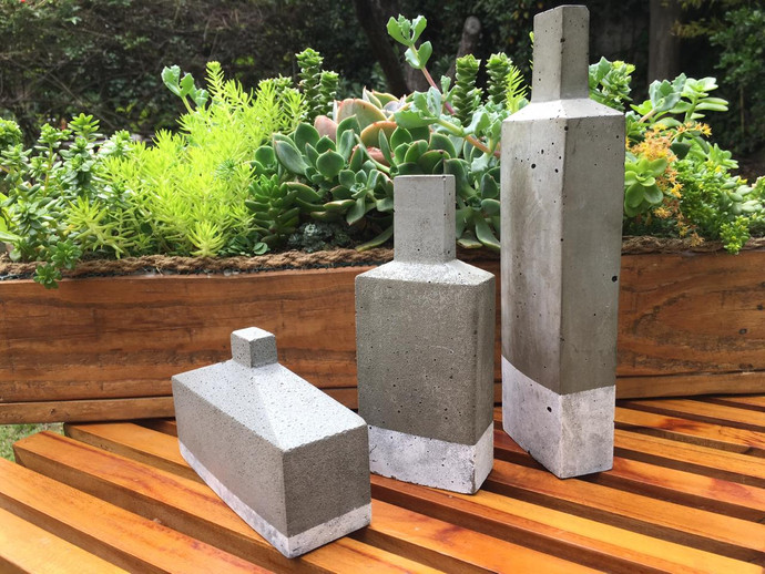 Esculturas de hormigón - esculturas de hormigon con forma de botellas.jpeg